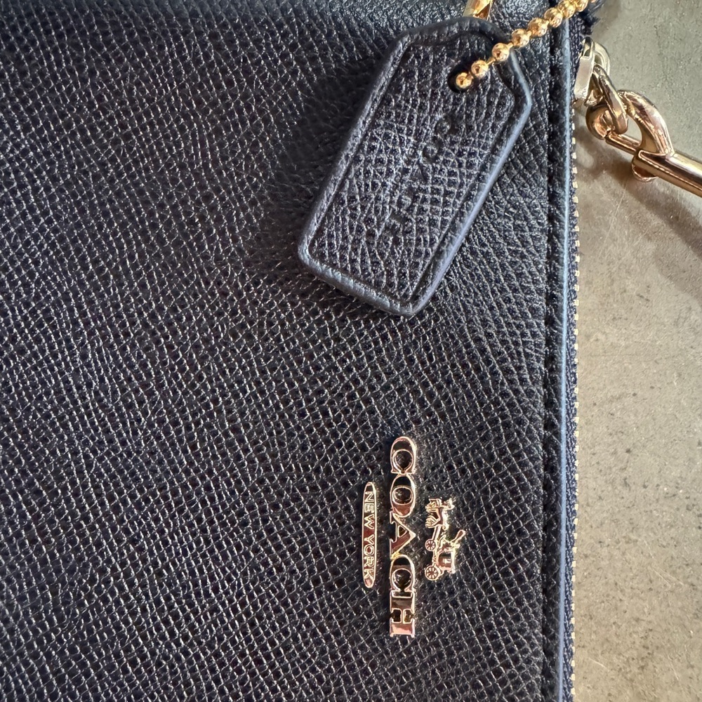 Coach Black Pebbled Leather Clutch with Gold Accents